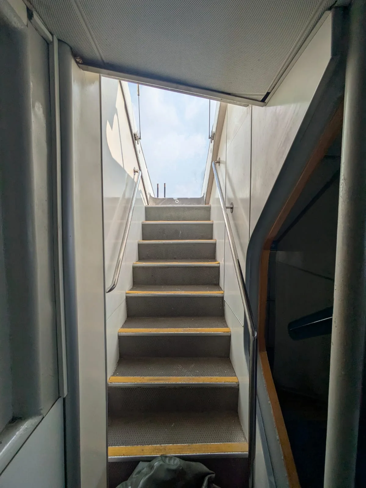 Crew boat for sale — internal stairway connecting the main and upper passenger decks