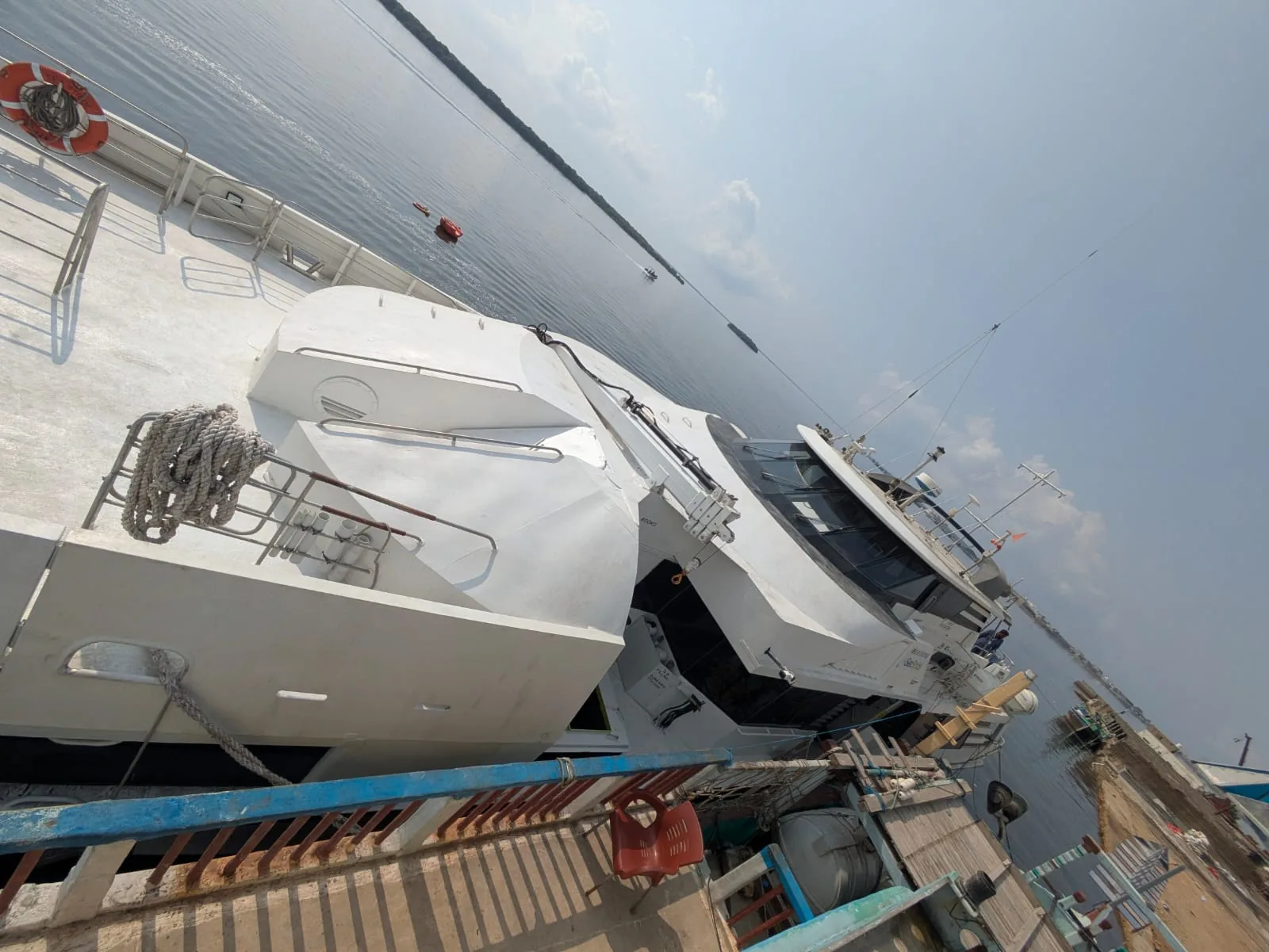 Second hand ferry for sale — superstructure, upper deck and mast seen from the quay